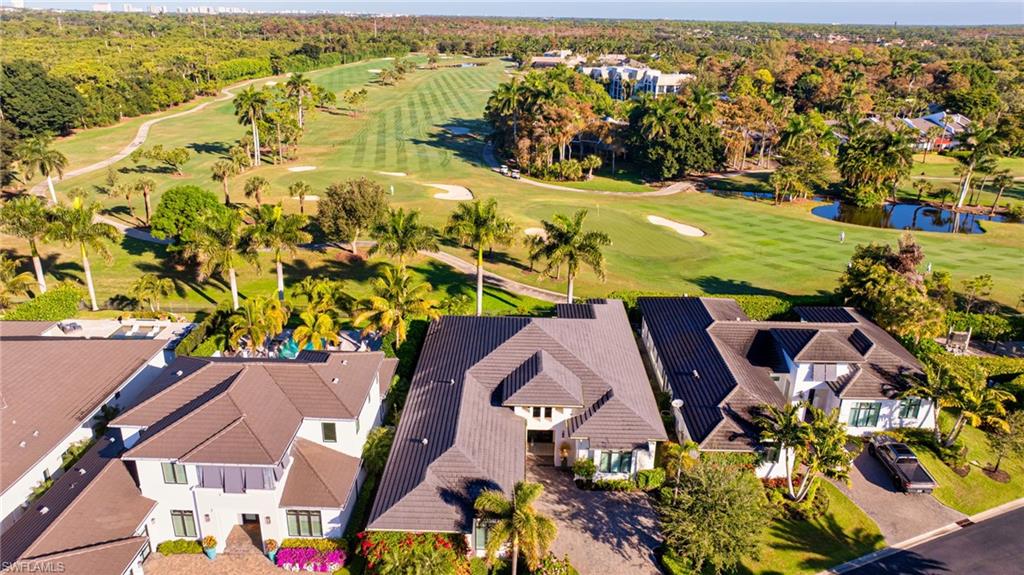 1671 Vinland Way Naples, FL 34105 - Photo 30 of 50 an aerial view of residential houses with outdoor space