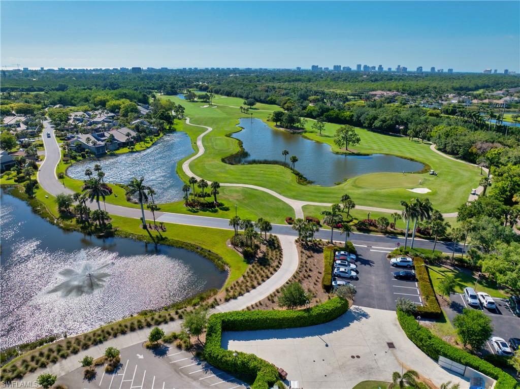 1671 Vinland Way Naples, FL 34105 - Photo 50 of 50 an aerial view of a house with a swimming pool yard and outdoor seating