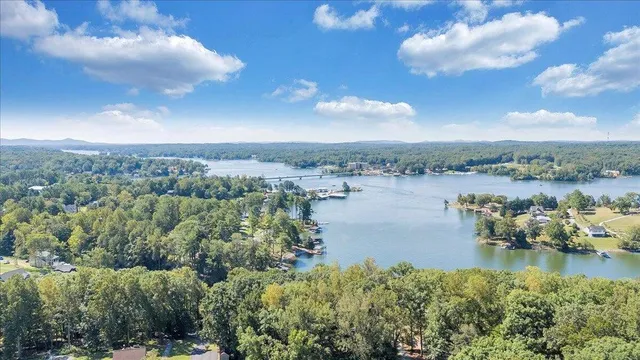 a view of a lake with a yard