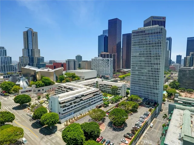 a view of a city with tall buildings