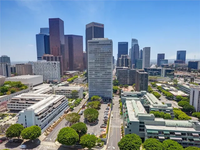 a view of city with tall buildings