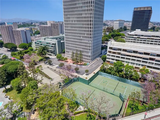 an aerial view of a house with a garden