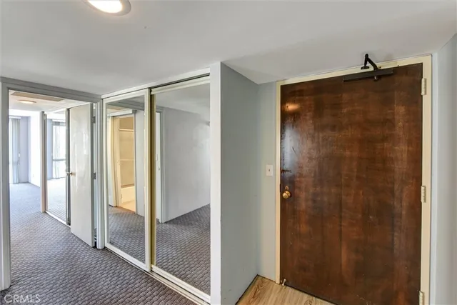a bathroom with a shower and a glass door