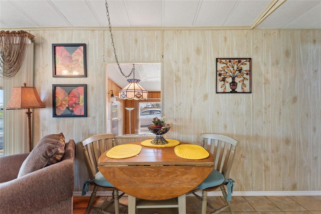 251 Patterson Road, Unit G9 Haines City, FL 33844 - Photo 12 of 40 a dining room with furniture and window
