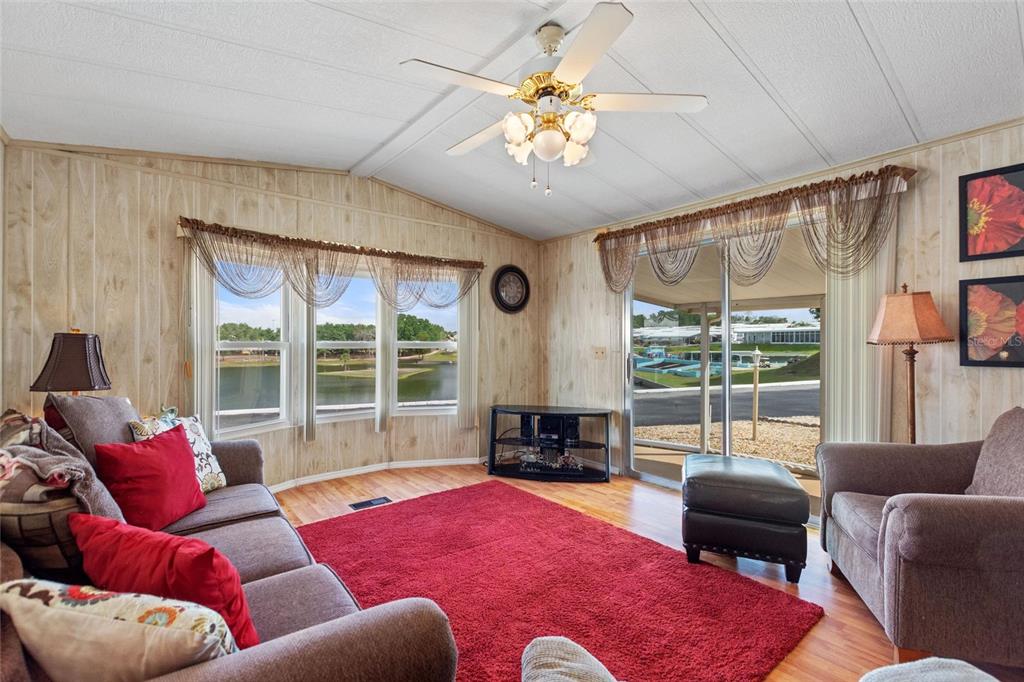 251 Patterson Road, Unit G9 Haines City, FL 33844 - Photo 16 of 40 a living room with furniture and a large window