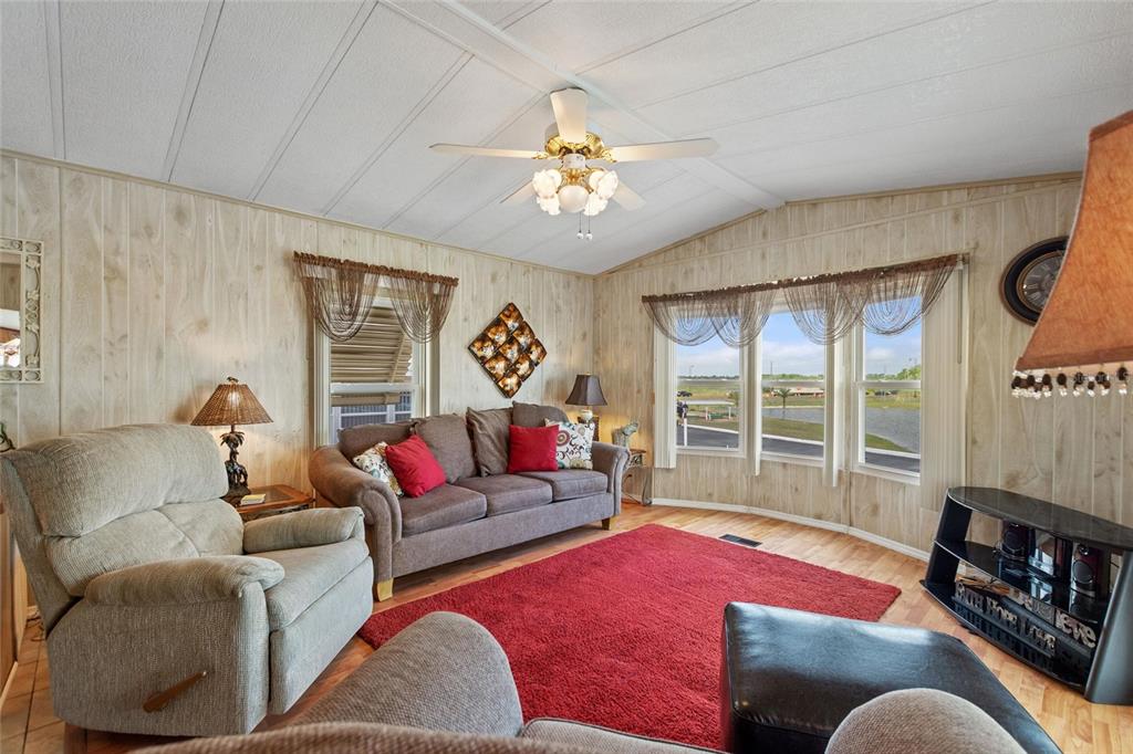 251 Patterson Road, Unit G9 Haines City, FL 33844 - Photo 17 of 40 a living room with furniture and a large window