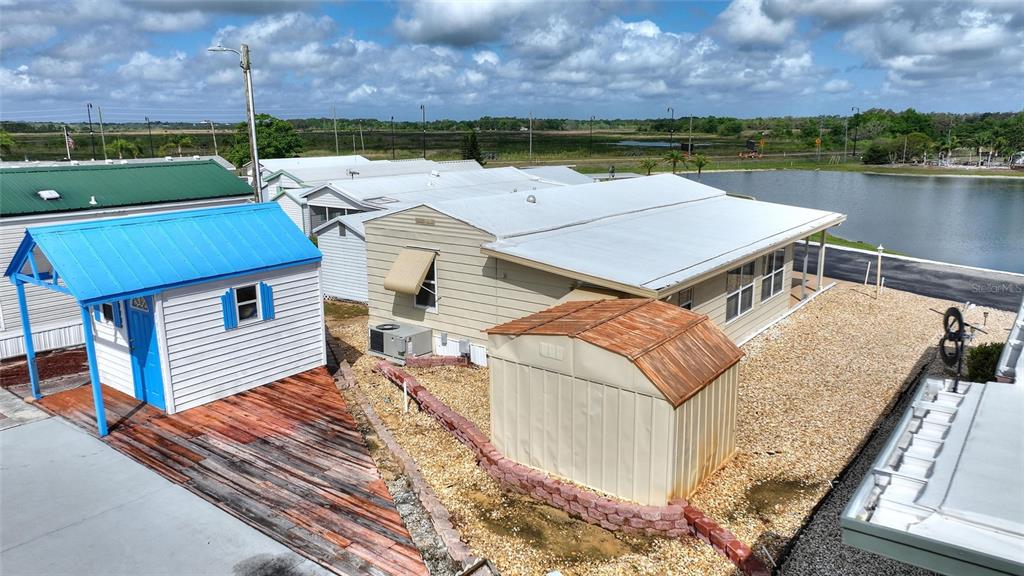 251 Patterson Road, Unit G9 Haines City, FL 33844 - Photo 28 of 40 a view of a patio with chair and table on the terrace