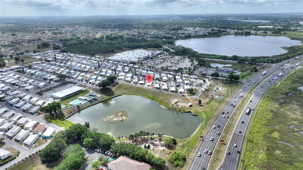 251 Patterson Road, Unit G9 Haines City, FL 33844 - Photo 32 of 40 an aerial view of residential houses with outdoor space