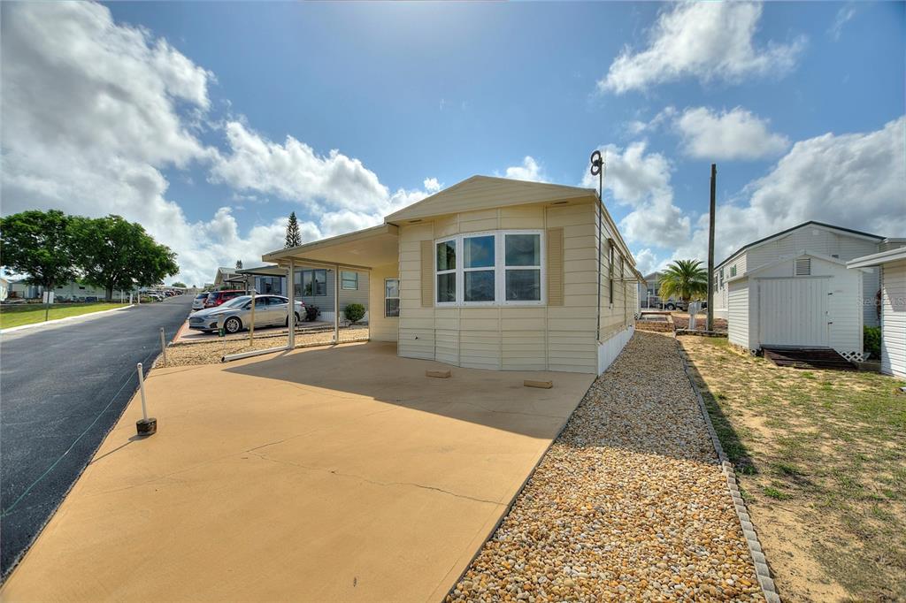 251 Patterson Road, Unit G9 Haines City, FL 33844 - Photo 5 of 40 a front view of a house with yard