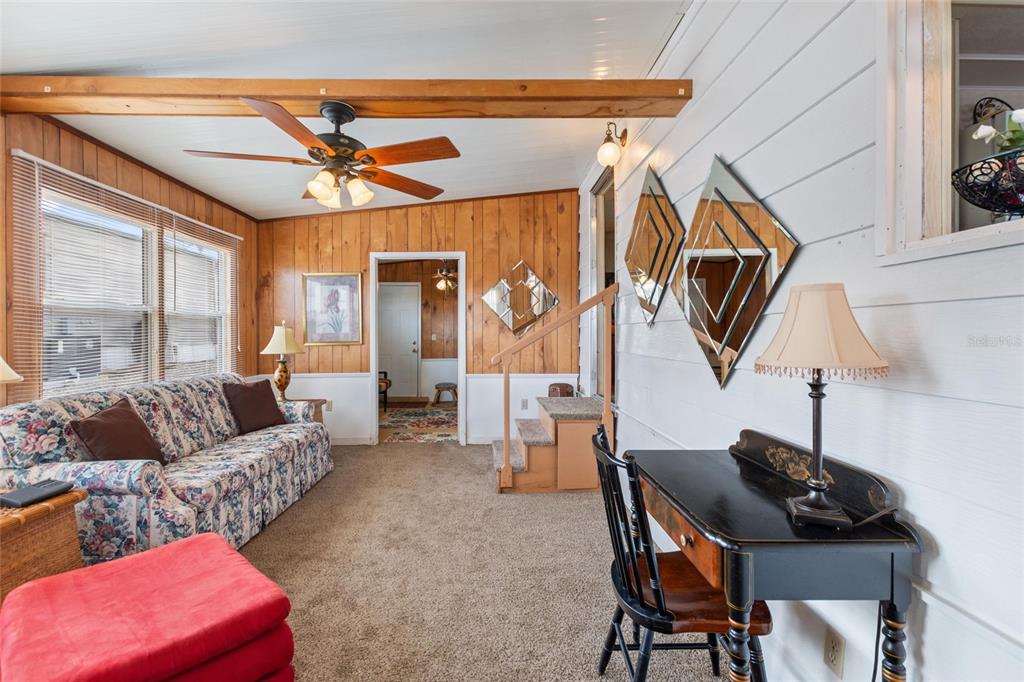 251 Patterson Road, Unit G9 Haines City, FL 33844 - Photo 7 of 40 a living room with furniture and a window