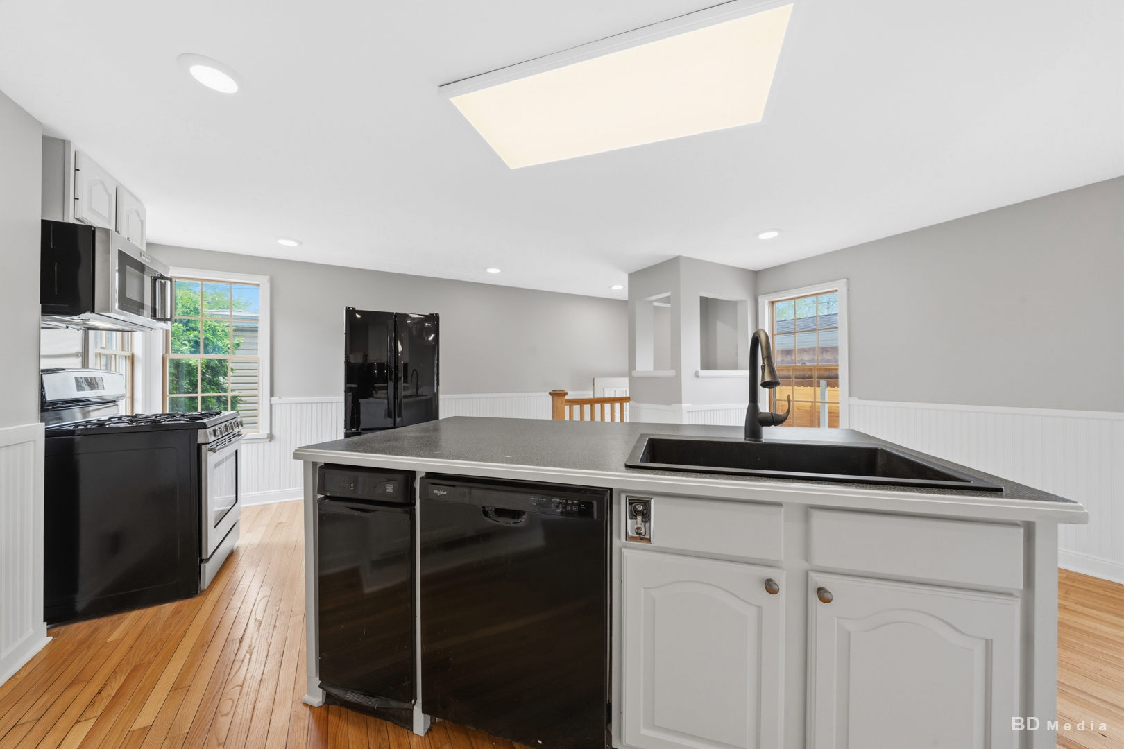 10428 South Springfield Avenue Chicago, IL 60655 - Photo 11 of 43 a kitchen with stainless steel appliances a sink and cabinets