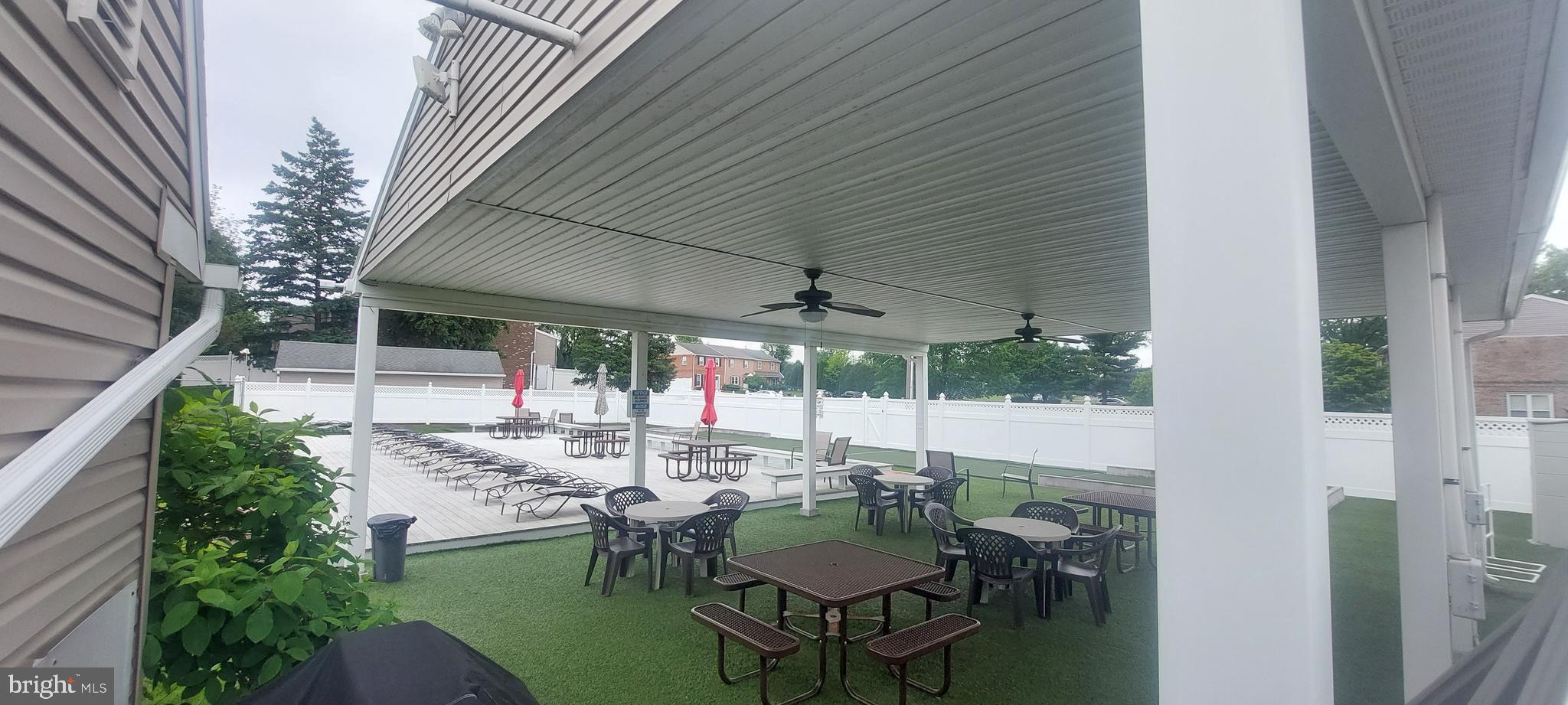 2900 State Hill Road, Unit I11 Wyomissing, PA 19610 - Photo 15 of 15 a view of a patio with couches table and chairs and potted plants