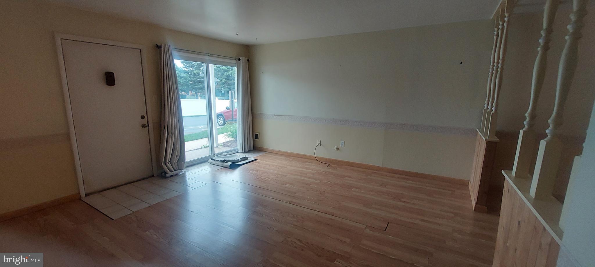 2900 State Hill Road, Unit I11 Wyomissing, PA 19610 - Photo 4 of 15 an empty room with wooden floor and windows