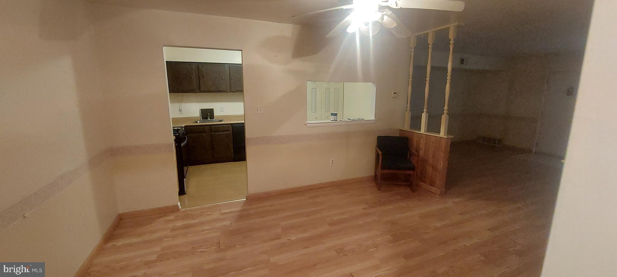 2900 State Hill Road, Unit I11 Wyomissing, PA 19610 - Photo 7 of 15 a view of an empty room with kitchen and a window