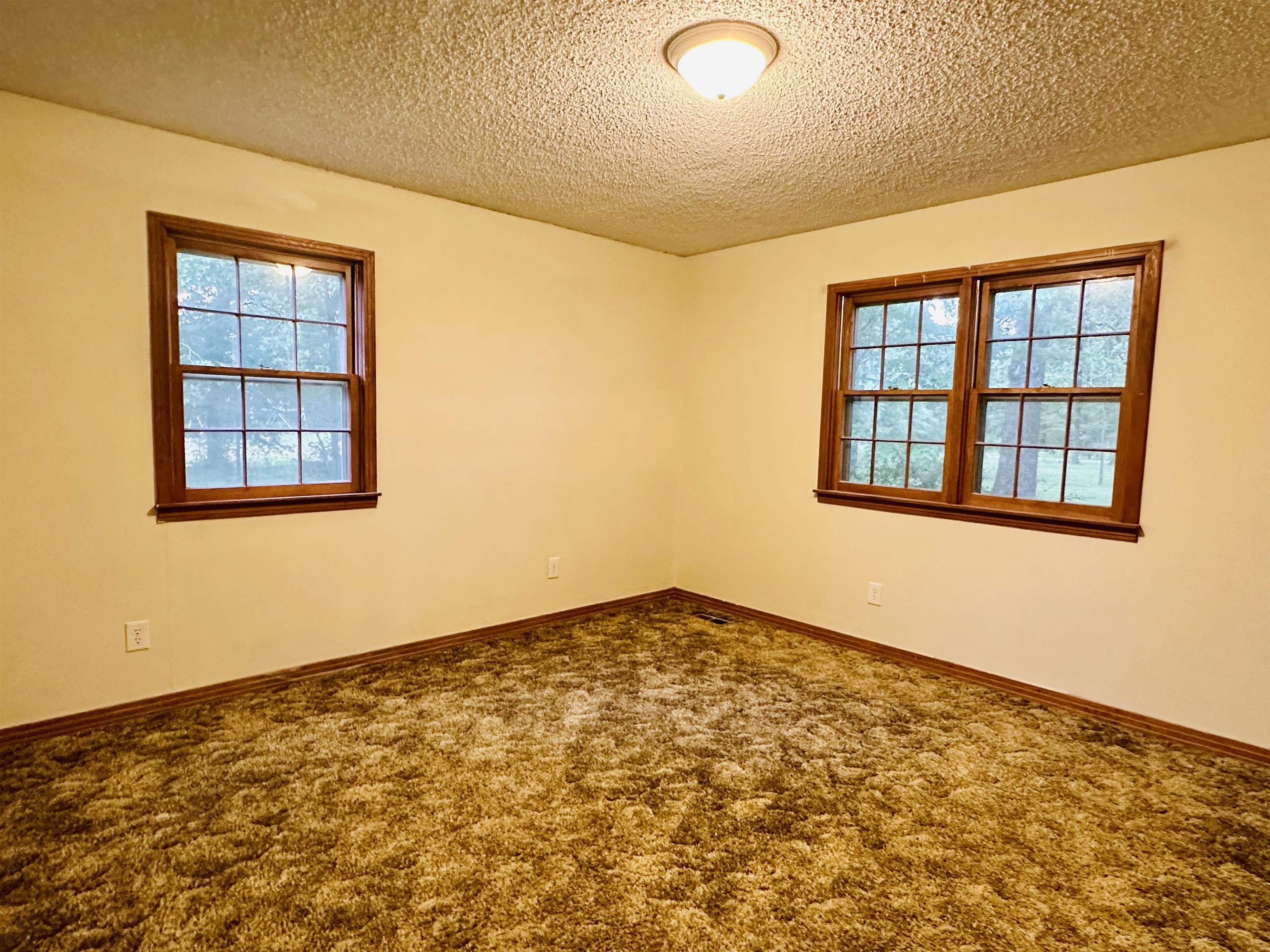 2733 New Hope Road Guys, TN 38339 - Photo 12 of 25 a view of an empty room with a window