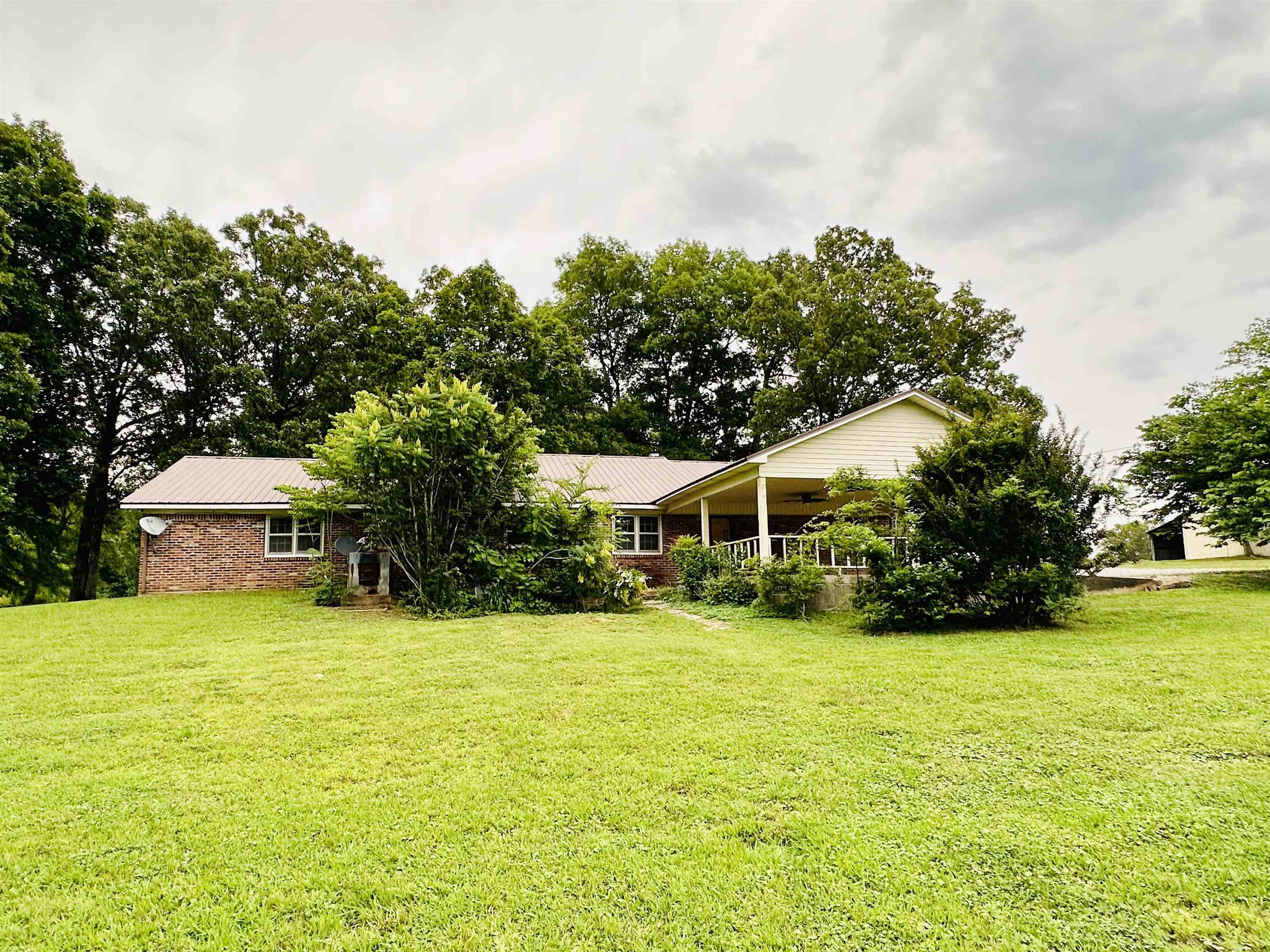 2733 New Hope Road Guys, TN 38339 - Photo 19 of 25 a view of a house with yard and garage