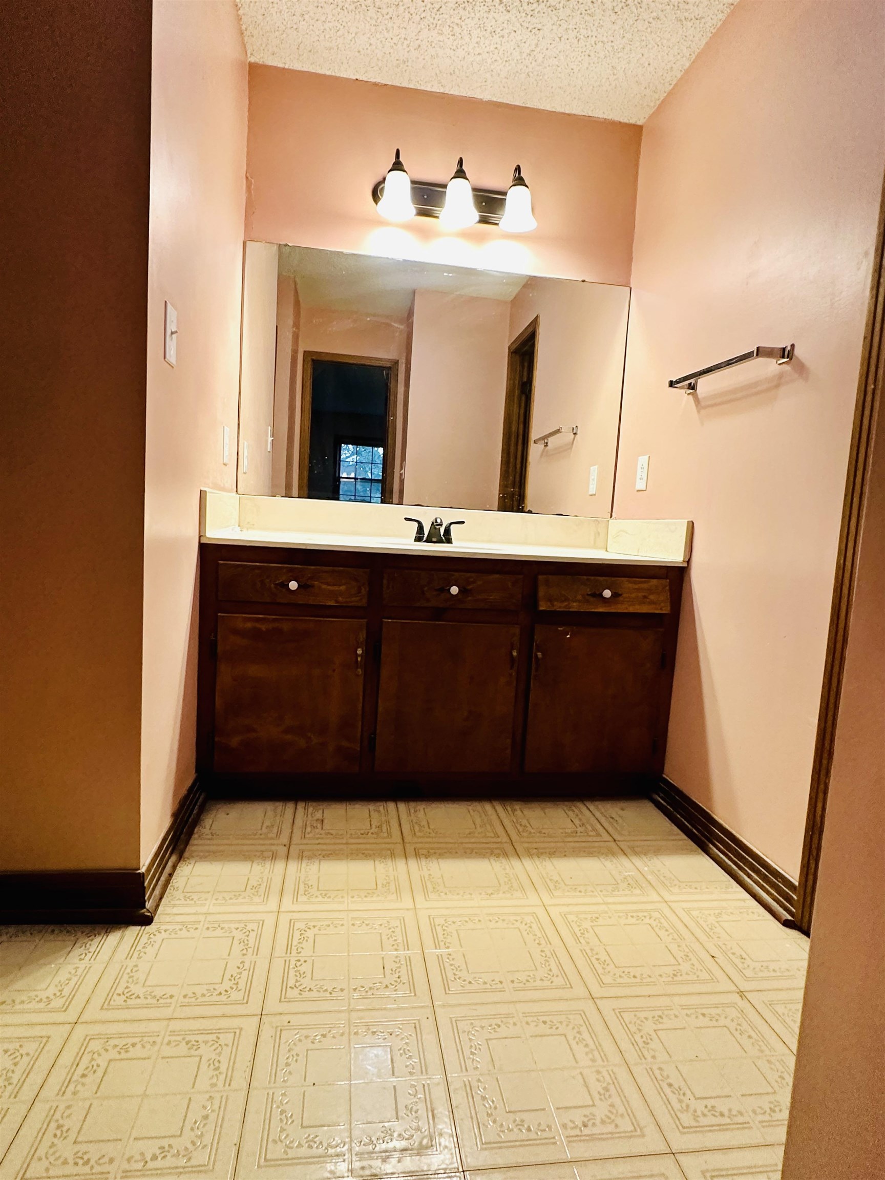 2733 New Hope Road Guys, TN 38339 - Photo 10 of 25 a bathroom with a sink and a mirror