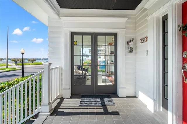 a living room with furniture or couch and a wooden floor