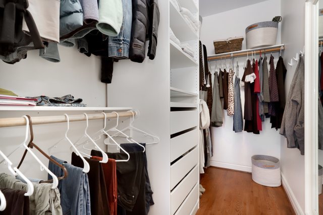 140 Ridge Avenue, Unit 2W Evanston, IL 60202 - Photo 24 of 36 a view of walk in closet with clothes and shoes