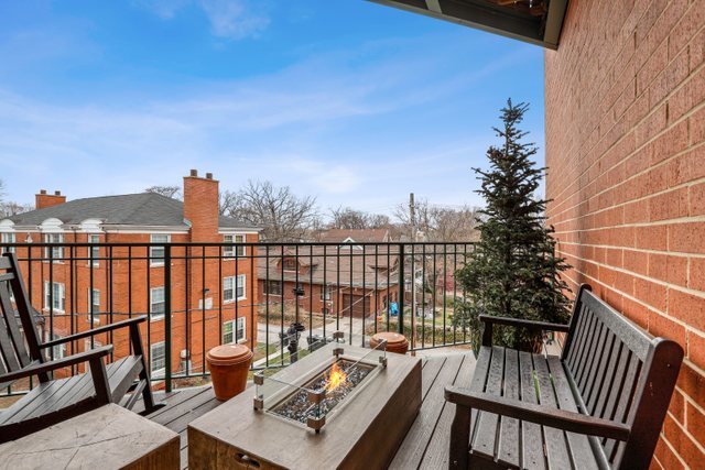 140 Ridge Avenue, Unit 2W Evanston, IL 60202 - Photo 32 of 36 a view of balcony with wooden floor and outdoor seating