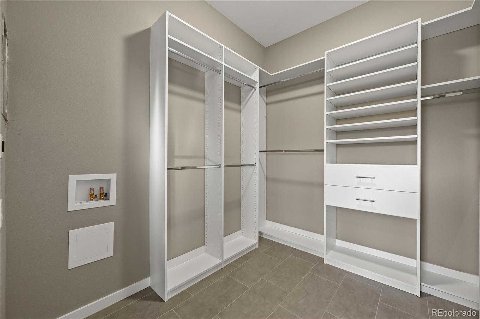 28424 Tepees Way Evergreen, CO 80439 - Photo 20 of 47 a view of an empty walk in closet