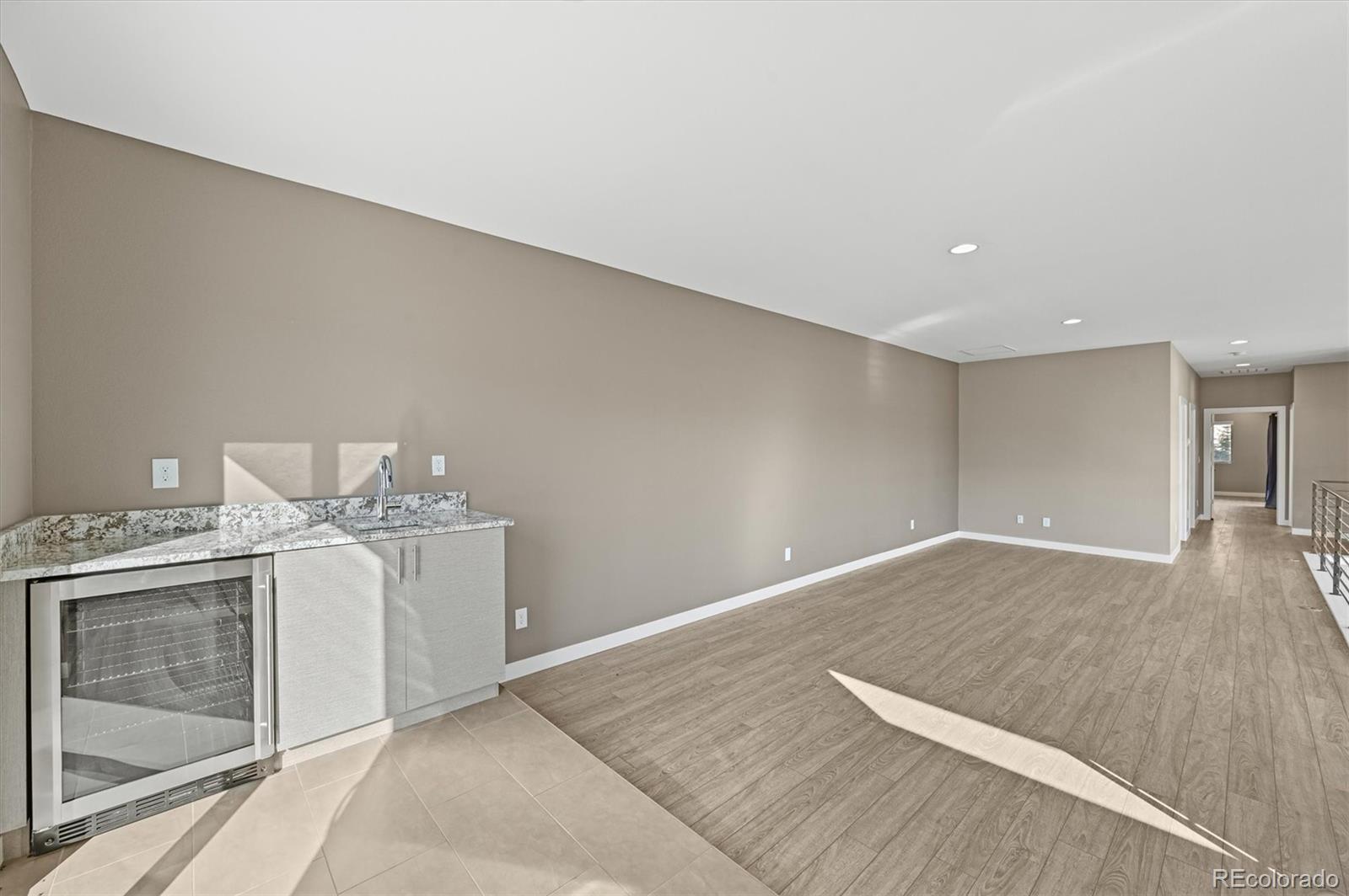 28424 Tepees Way Evergreen, CO 80439 - Photo 24 of 47 a view of kitchen and utility room