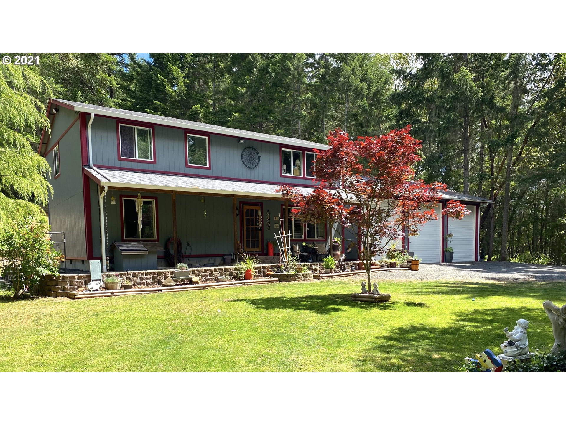 1803 Byron Creek Road Winston, OR 97496 - Photo 1 of 32 a view of a house with a swimming pool