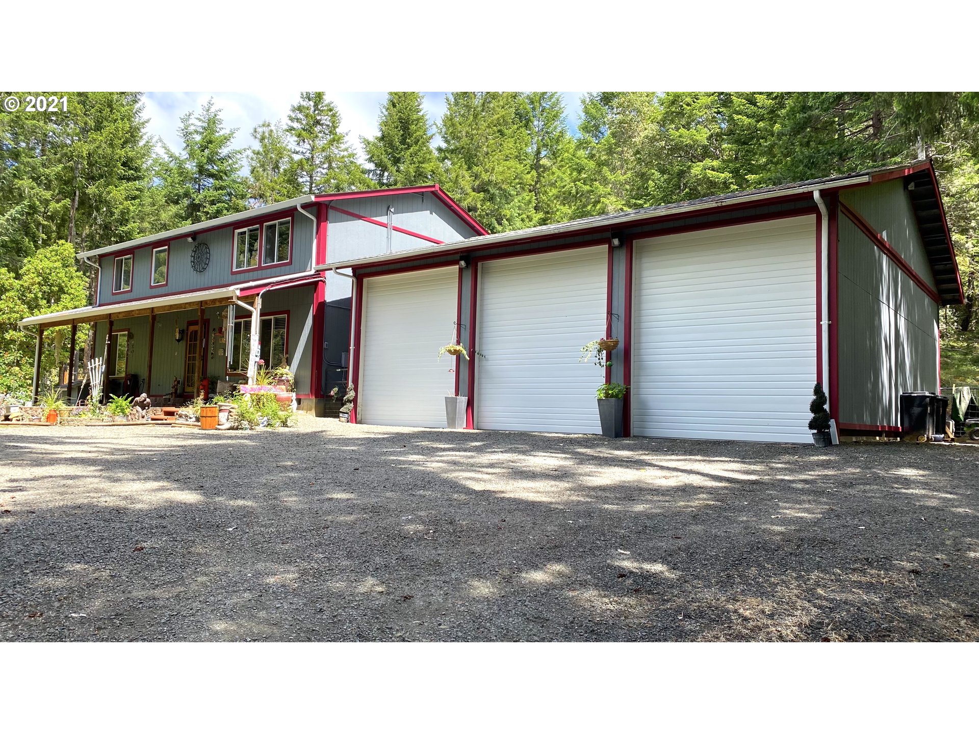1803 Byron Creek Road Winston, OR 97496 - Photo 3 of 32 a view of a house with a backyard