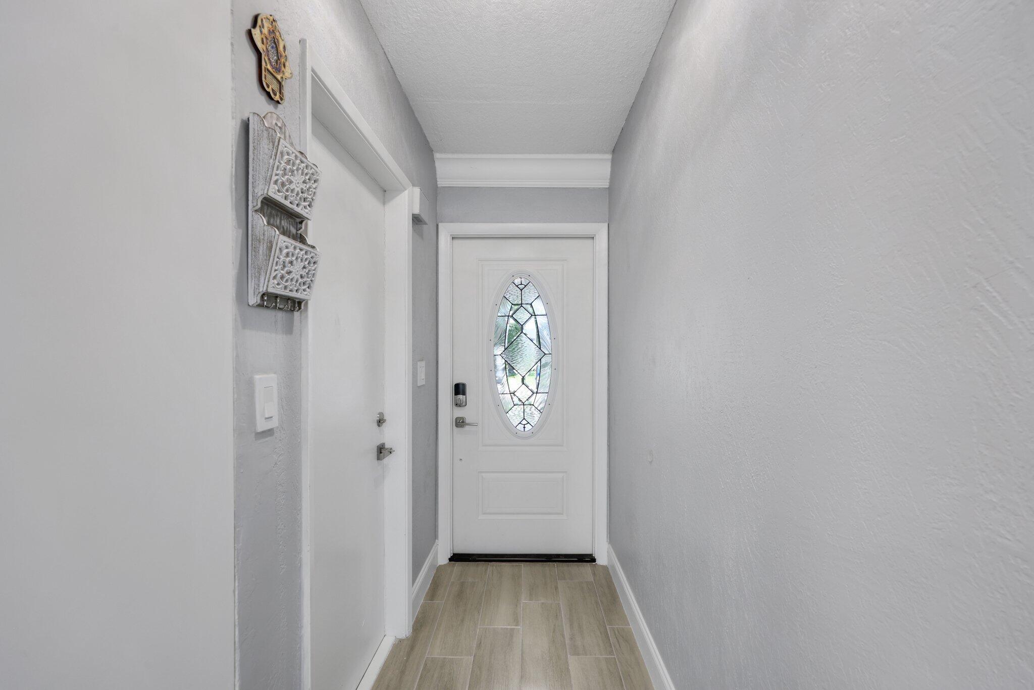 9305 Flynn Circle, Unit 8 Boca Raton, FL 33496 - Photo 4 of 31 img_9880.jpg-SMALL