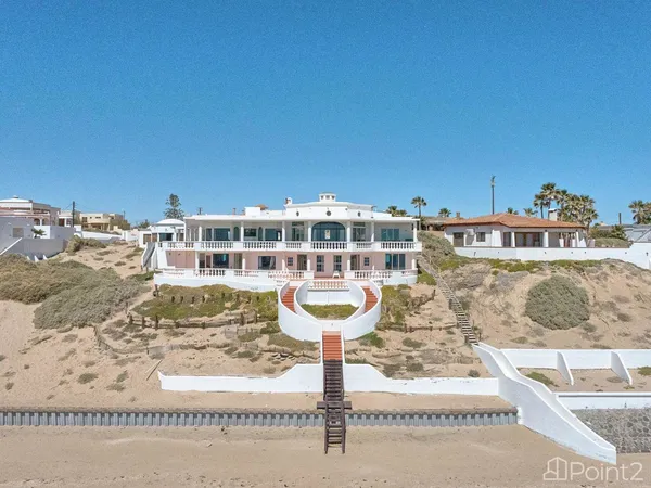 a view of a balcony with chairs