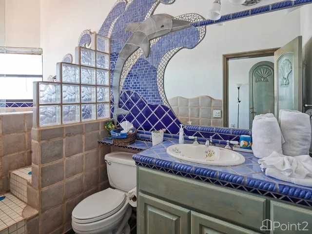 a room with furniture and a flat screen tv