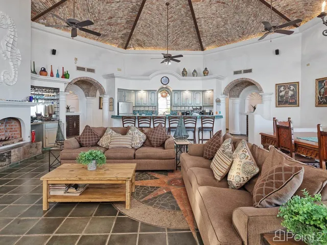 a view of a dining room with furniture and window