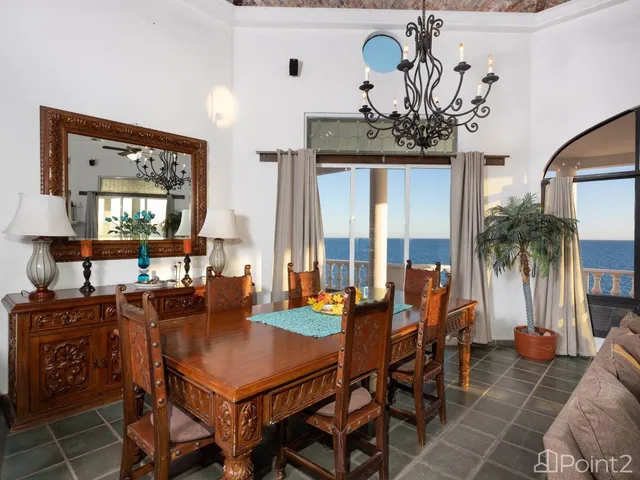 a view of a livingroom with furniture and window