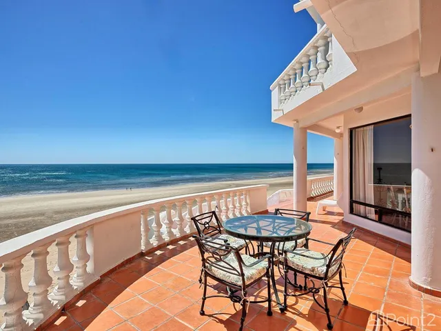 a view of a swimming pool with lounge chair
