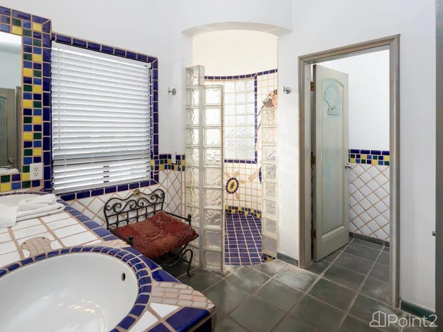 a view of a balcony with door