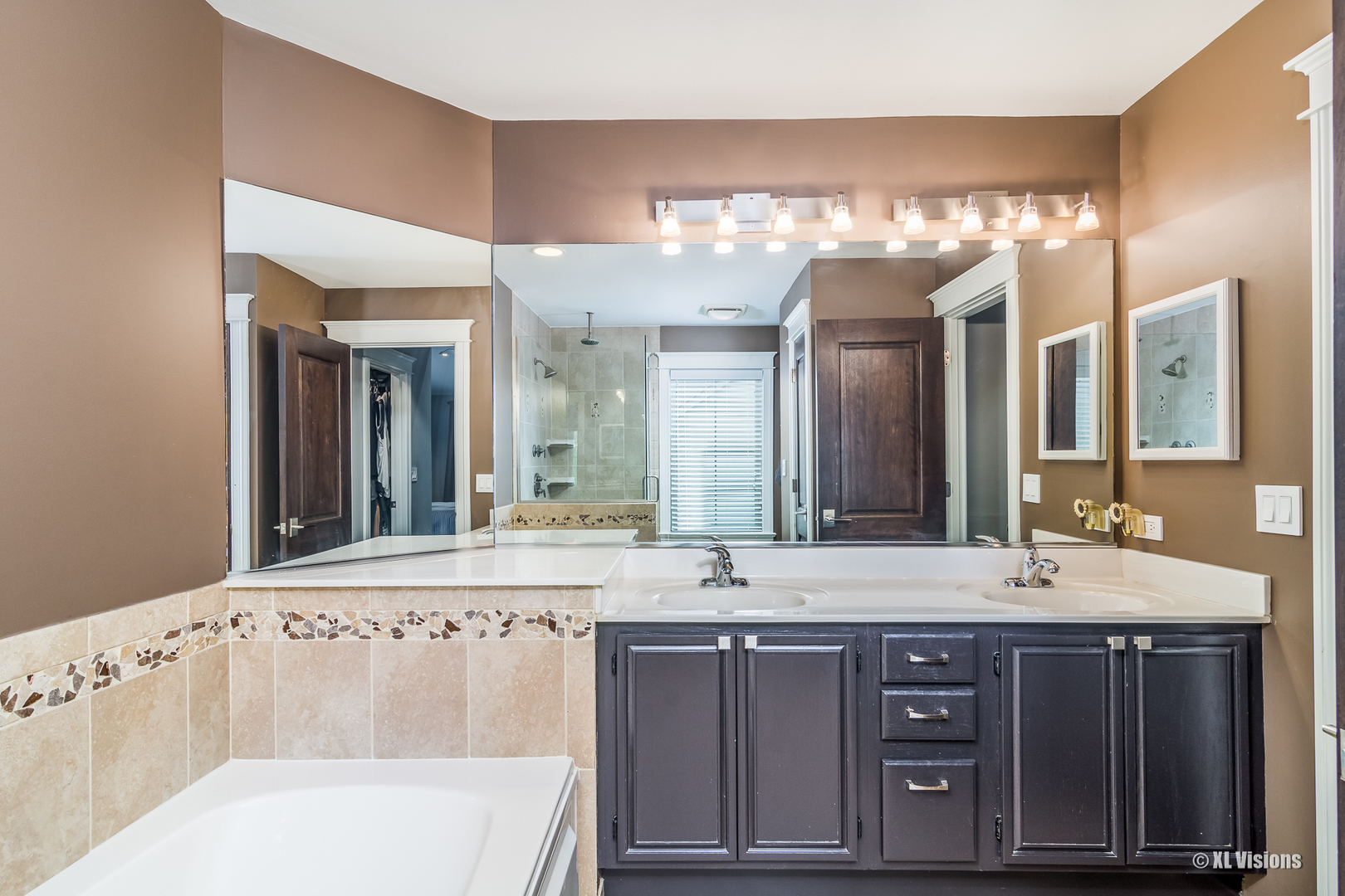 1360 Beacon Lane Bartlett, IL 60103 - Photo 16 of 26 a bathroom with a sink vanity and a mirror