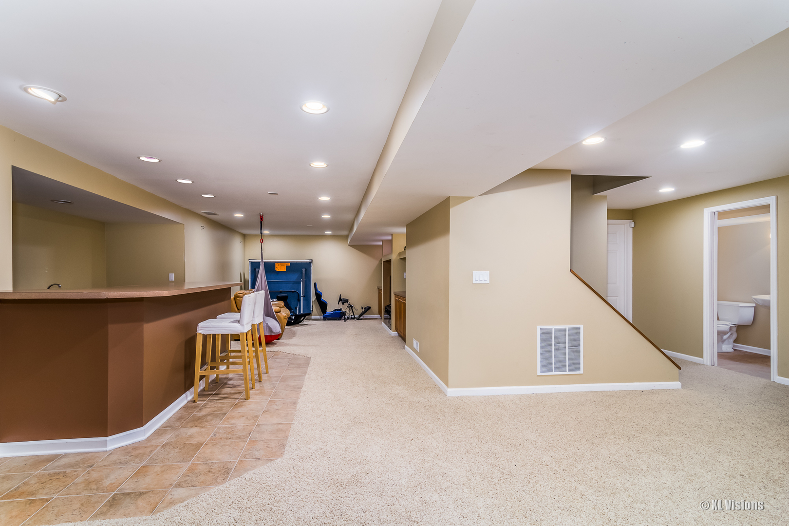1360 Beacon Lane Bartlett, IL 60103 - Photo 22 of 26 a view of a livingroom with furniture and stairs