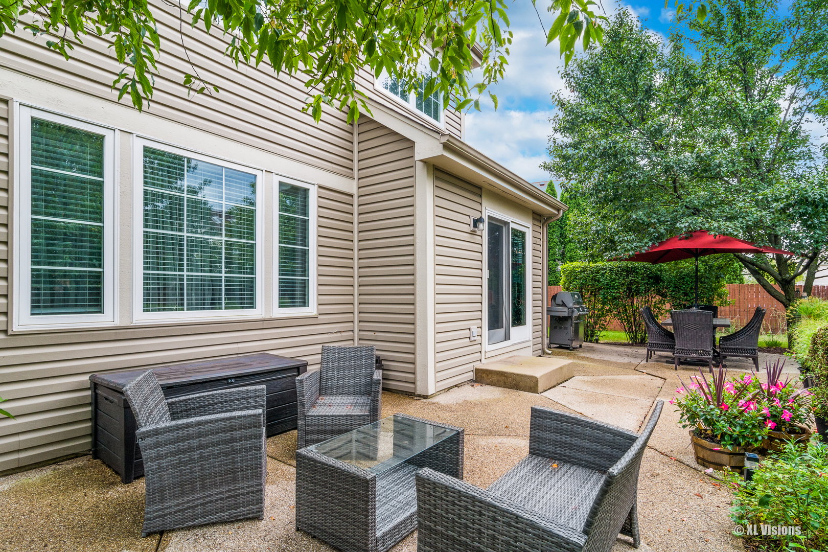 1360 Beacon Lane Bartlett, IL 60103 - Photo 25 of 26 a backyard of a house with seating space