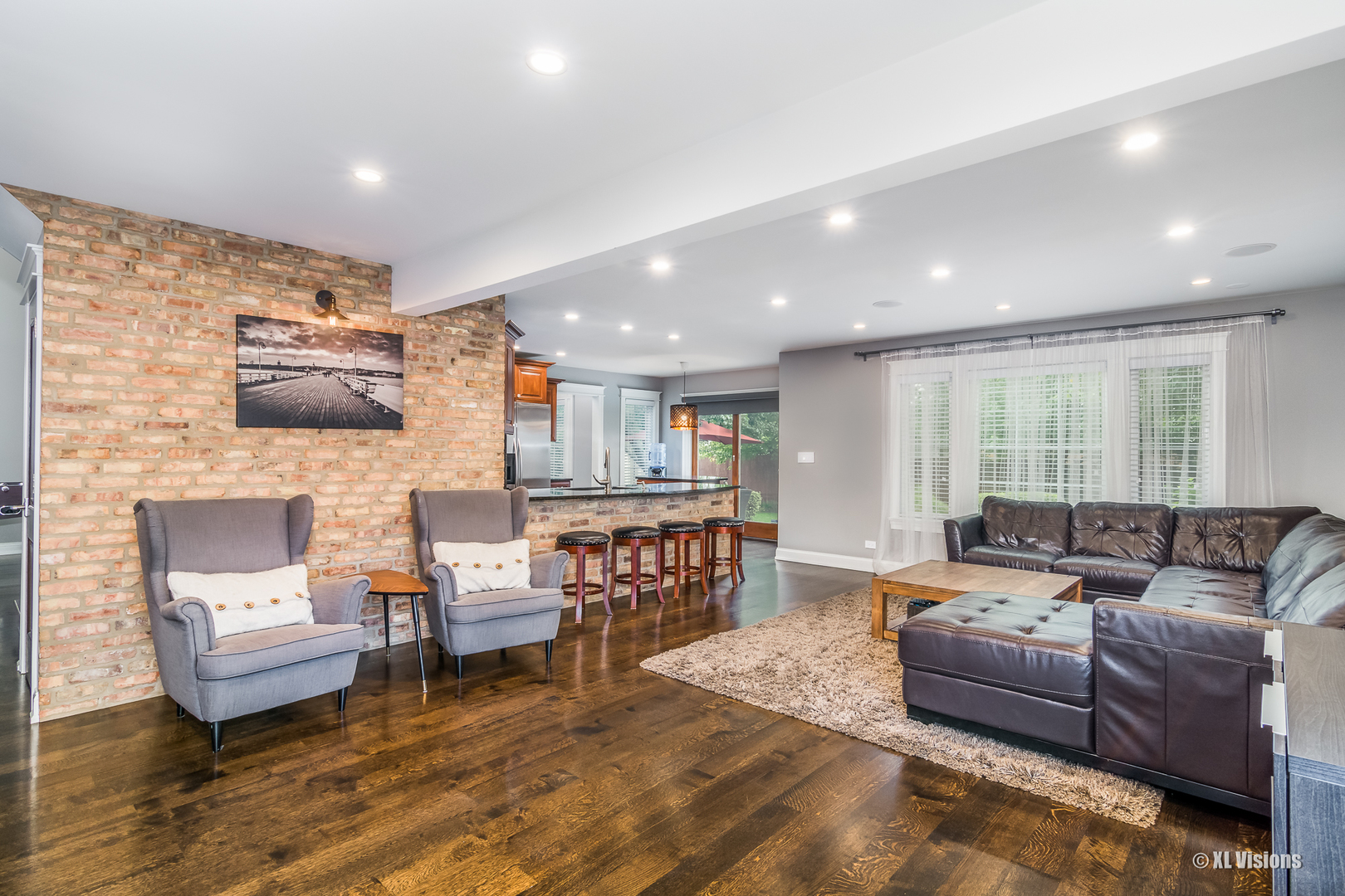 1360 Beacon Lane Bartlett, IL 60103 - Photo 5 of 26 a living room with furniture and a wooden floor