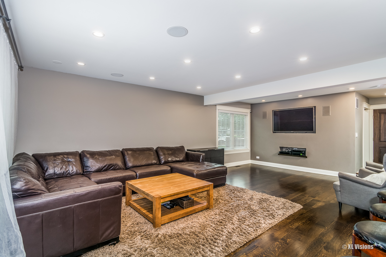 1360 Beacon Lane Bartlett, IL 60103 - Photo 6 of 26 a living room with furniture and a flat screen tv