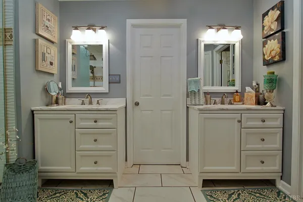 a kitchen with a sink cabinets and window