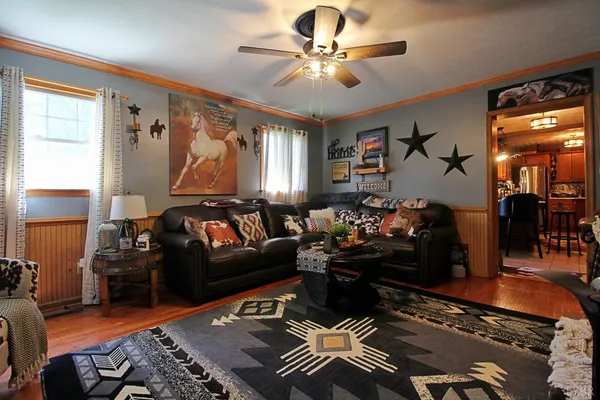 a bedroom with a bed and a mirror
