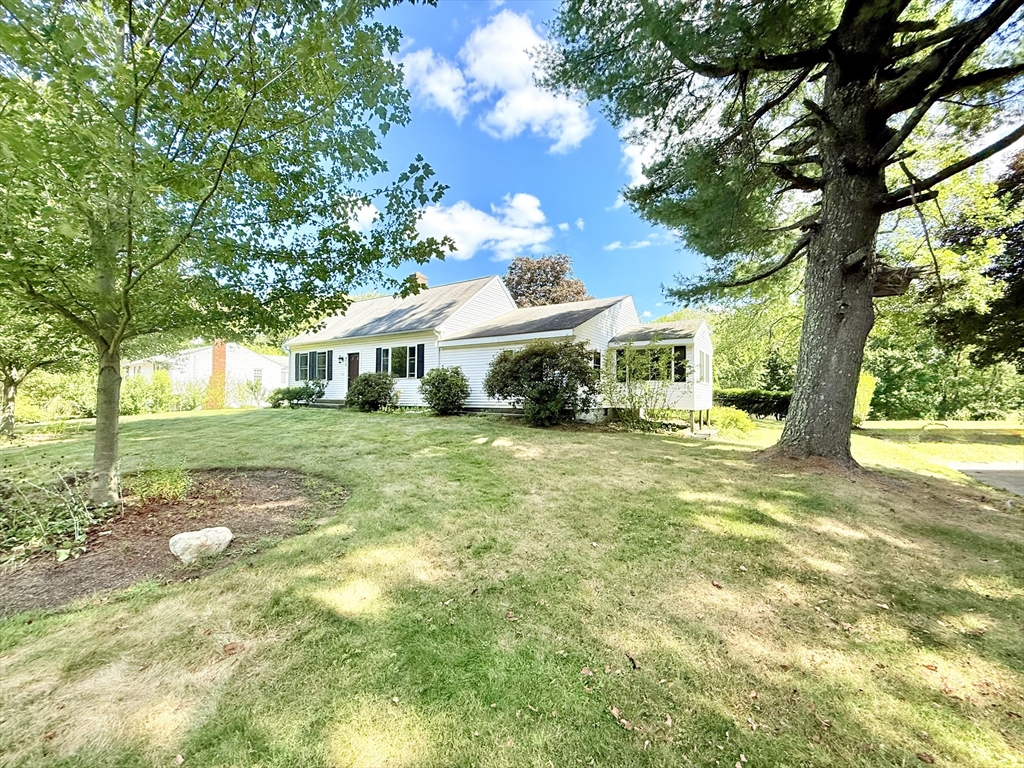 975 South Main Street Bellingham, MA 02019 - Photo 2 of 38 a front view of a house with garden