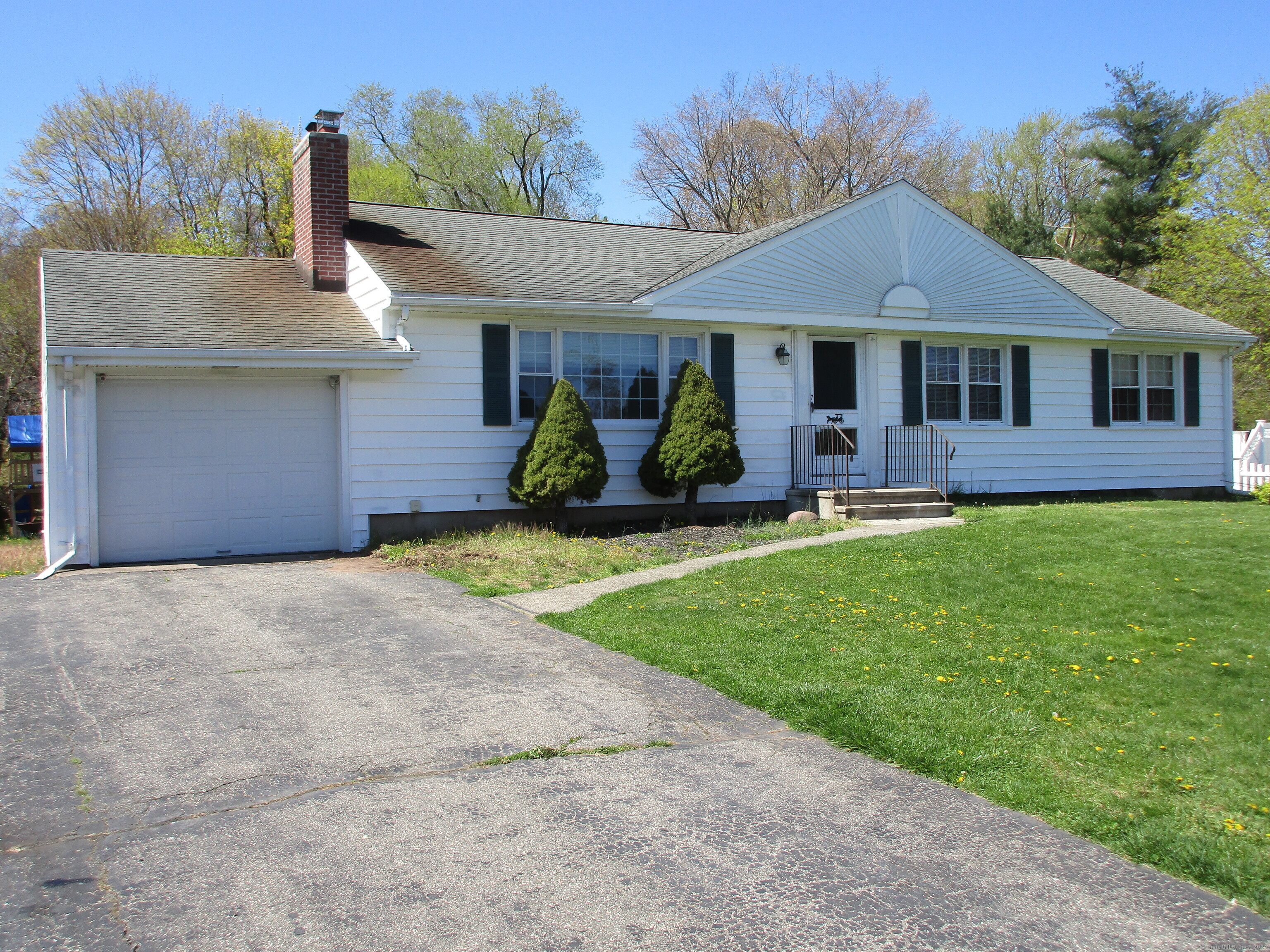 7 Mattes Road Hamden, CT 06514 - Photo 1 of 1 a front view of a house with garden