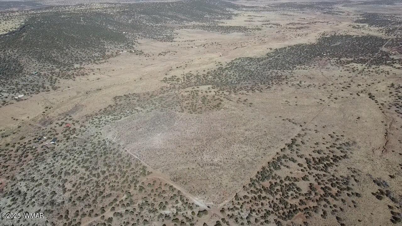 4230 Stirrup Road Snowflake, AZ 85937 - Photo 25 of 35 a view of a dry yard with wooden fence