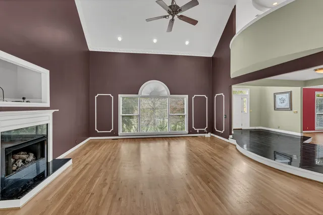 a bathroom with double sink and a mirror