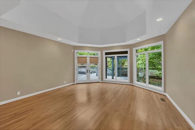 a bathroom with a bathtub and a toilet