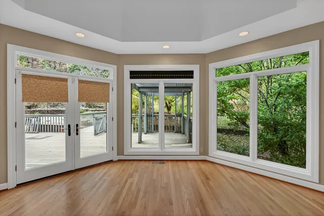 a view of an empty room with a window