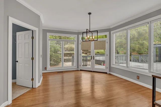 a backyard of a house with lots of green space