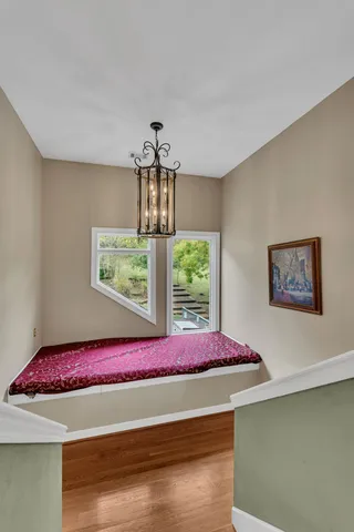 a view of backyard with plants and lake view